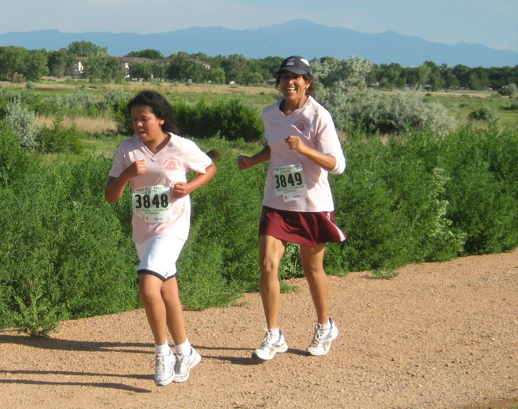 mother daughter running